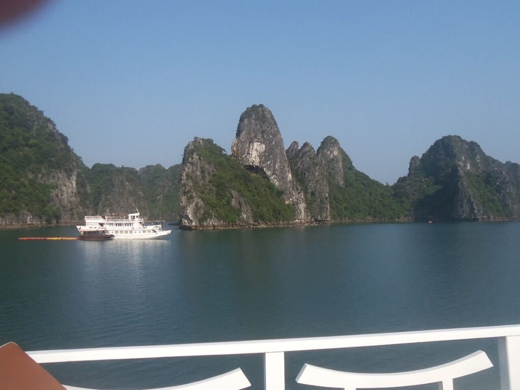 Boat among the Ha Long karsts