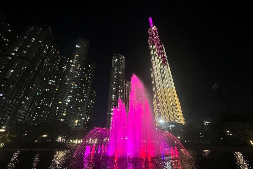 The park at Vinhomes Central Park at night, a short walk from Landmark 2