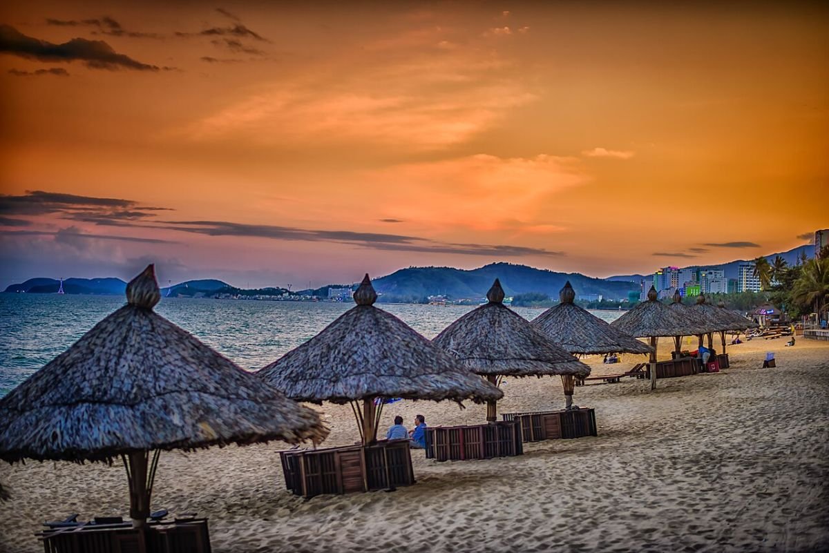 Beach umbrellas at sunset in Nha Trang