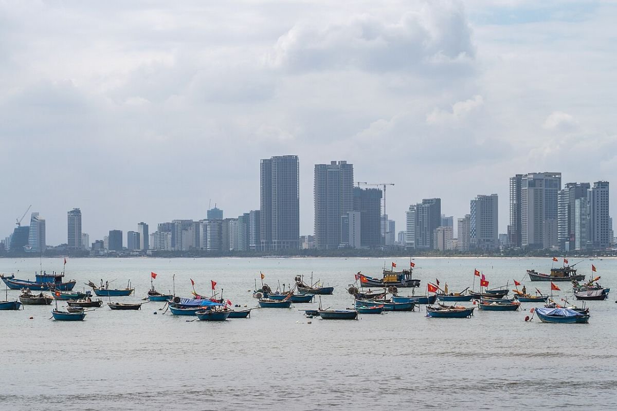 Fishing boats in front of the Da Nang skyline