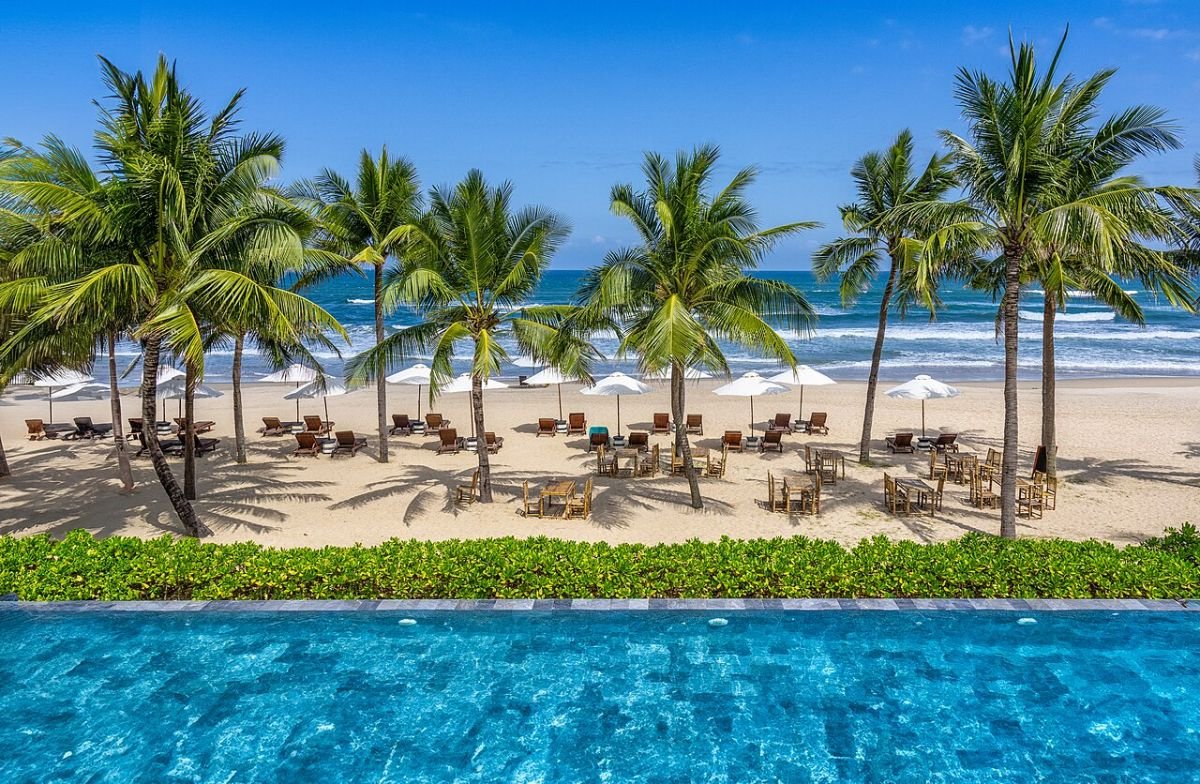 Palm trees and pool near the Da Nang beachfront