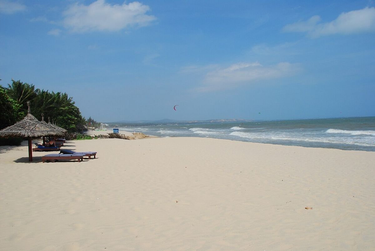 Palm-fringed beach in Mui Ne