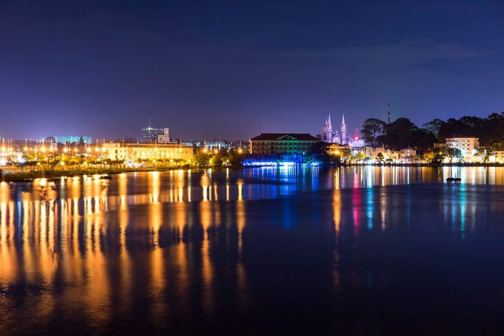 The Saigon River and city lights at night, seen from this Saigon Pearl duplex for sale