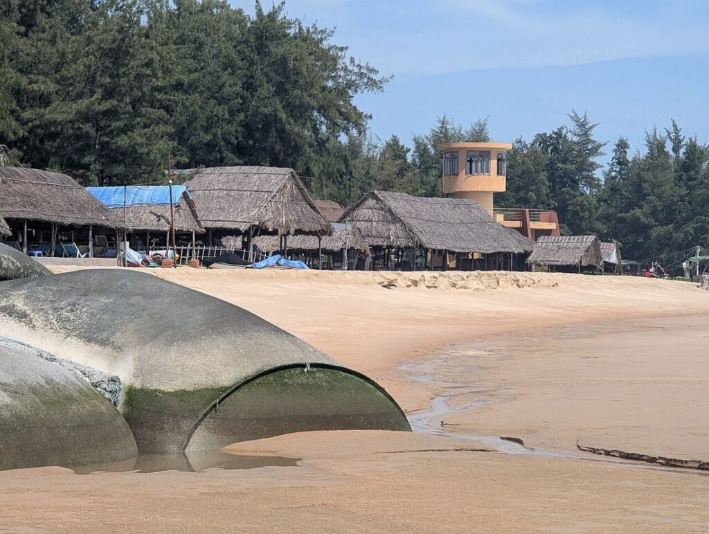 Thatched huts on the Ho Tram shore