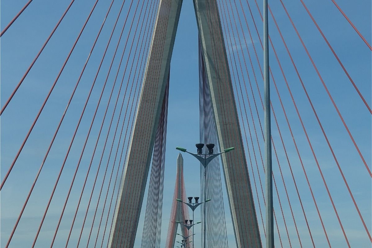 Thu Thiem Bridge next to The Metropole Thu Thiem, linking it to District 1